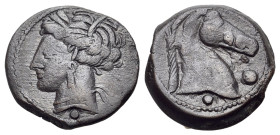 North Africa, Carthage, Æ (18mm, 4.98g., 8h). Sardinian(?) mint, c. 300-264 BC. Wreathed head of Tanit l. / Head of horse r.; pellet below, large pell...