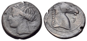 North Africa, Carthage, c. 300-264 BC. Æ (19mm, 4.65g., 2h). Head of Tanit l., wearing grain wreath and pendant earring. R/ Head of horse r.; Punic le...
