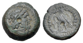 Ptolemaic Kings of Egypt, Ptolemy V Epiphanes (204-180 BC). Æ Hemiobol (13mm, 1.94g., 12h). Laureate head of Zeus Ammon facing r. R/ Eagle with folded...