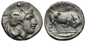 Lucania. Thurium. Stater struck under Hera- (Magistrate). Circa 410-350 BC (Silver, 21.1 mm, 7.75 g). Head of Athena right, wearing crested helmet dec...