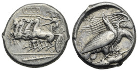 Sicily. Akragas. Tetradrachm. Circa 409-406 BC (Silver, 26mm, 17.43 g, 12h). Nike driving fast quadriga left, holding kentron and reins; on tablet abo...