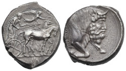 Sicily. Gela. Tetradrachm. Circa 450-440 BC (Silver, 25.29 mm, 16.97 g). Charioteer driving slow quadriga right, holding kentron and reins; above, Nik...