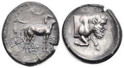 Sicily. Gela. Tetradrachm. Circa 420-415 BC (Silver, 28.72 mm, 17.33 g). Charioteer driving slow biga right, holding kentron and reins; above, Nike fl...