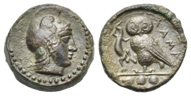 Sicily. Kamarina. Tetras or Trionkion. Circa 410-405 BC (Bronze, 15.36 mm, 3.52 g). Helmeted head of Athena right. Rev. KAMA, Owl standing left, head ...