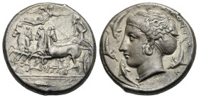 Sicily. Syracuse. Tetradrachm struck under Dionysios I. Circa 405-395 BC (Silver, 25.5 mm, 17.13 g). Charioteer driving fast quadriga pracing left, ho...
