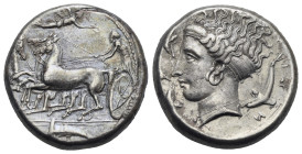 Sicily. Syracuse. Tetradrachm struck under Dionysios I. Circa 405-400 BC (Silver, 24.33 mm, 16.82 g). Charioteer, holding kentron and reins, driving f...