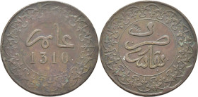 MULAY AL HASSAN I 1290-1311. Fez. 4 felus. 1310. Reverso girado 30 grados