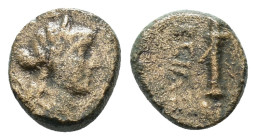 CAPPADOCIA. Caesarea (as Eusebeia). Ae (1st century BC).

Obv: Head of Artemis right.
Rev: EVΣE / BEIAΣ.
Quiver; uncertain control to outer left....