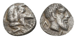 CARIA. Euromos. Hemiobol (Circa 5th century BC).

Obv: Forepart of boar right.
Rev: YPΩ.
Laureate, bearded head right.
SNG von Aulock 2521.

Co...