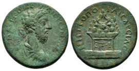 CAPPADOCIA. Caesarea. Commodus (177-192). Ae. Dated RY 11 (190).

Obv: .Laureate, draped and cuirassed bust right.
Rev: / ЄT I.
Altar surmounted by Mt...