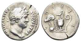 HADRIAN (117-138). Denarius. Rome.

Obv: HADRIANVS AVGVSTVS.
Laureate bust right, with slight drapery.
Rev: COS III.
Emblems of the augurate and ponti...