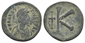 ANASTASIUS I.(491-518).Constantinople.Half Follis.

Obv : D N ANASTASIVS PP AVG.
Pearl diademed, draped, cuirassed bust to right.
Rev : Large K, long ...