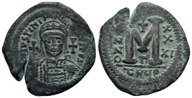 JUSTINIAN I (527-565 AD). Ae. Follis. Antioch.

Obv : D N IVSTINIANVS P P A.
Helmeted and cuirassed bust facing, holding globus cruciger and shield; c...