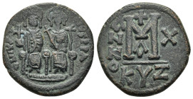JUSTIN II and SOPHIA.(565-578 AD). Ae. Follis. Cyzicus.

Obv : D N IVSTI NVS PP AV.
Justin and his wife Sophia, both nimbate, seated facing on throne:...