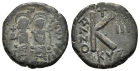 JUSTIN II and SOPHIA.(565-578 AD). Ae. Half Follis.

Obv : D N IVSTINVS P P AVG.
Justin and Sophia seated facing on double throne, holding globus cruc...