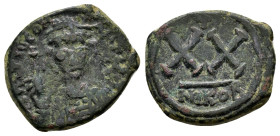 TIBERIUS II CONSTANTINE (578-582 AD). Ae. Half Follis. Nicomedia.

Obv: D m TIB CONSTANT P P AVG.
Helmeted, draped and cuirassed bust facing, holding ...