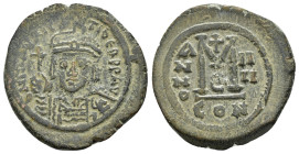 MAURICE TIBERIUS.(582-602).Constantinople.Follis.

Obv : D N MAVRIC TIЬЄR P P AV.
Crowned facing bust, wearing consular robes and holding mappa and ea...