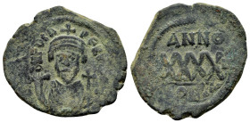 PHOCAS (602-610 AD). Ae. Follis. Constantinople. 

Obv: D N FOCAS PERP AVG.
Crowned bust facing, holding mappa and cross(?).
Rev: Large XXXX; ANNO abo...