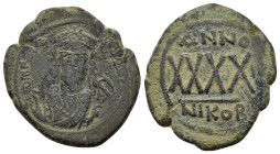PHOCAS (602-610 AD). Ae. Follis. Nicomedia. Dated RY 3 (607/8).

Obv: D N FOCAS EPPAV (S).
Crowned bust facing, wearing consular robes and holding map...
