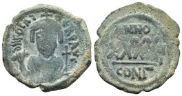 PHOCAS. (602-610 AD). Ae. Follis. Constantinople. 

Obv: DM FOCAE PP AVG, crowned, mantled bust facing, holding mappa and cross (or mappa and eagle-ti...