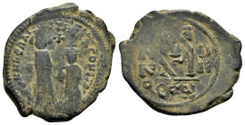 HERACLIUS with HERACLIUS CONSTANTINE (610-641 AD) Ae. Follis. Constantinople

Obv : Heraclius and Heraclius Constantine standing facing, Heraclius hol...