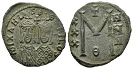 MICHAEL II AMORIANUS with THEOPHILUS.(820-829).Constantinople.Follis.

Obv : MIXAHL S ΘEOFILOS.
Crowned facing busts of Michael, wearing chlamys, and ...