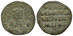 CONSTANTINE VII with ROMANUS I.(913-959).Constantinople.Follis.

Obv : + RωMAҺ ЬASILЄVS RωM.
Crowned facing bust of Romanus, holding globus cruciger a...