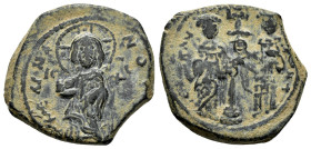 CONSTANTINE X DUCAS.(1059-1067 AD). Ae. Constantinople.Follis.

Obv : +EMMA NOVHA.
Christ standing facing on footstool, wearing nimbus and holding Gos...