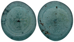 BYZANTINE WEIGHT. (Circa 550-650 AD). Glas

Obv: Monogram: Dometiou: Dometios; Discoidal, light greenish, translucent; stamped with cruciform monogr...