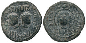 ARTUQID of MARDIN.Najim al-Din Alpi.(1152-1176).No mint & No Date.AE Dirhem. ﻣﻠﻚ ﺩﻳﺎﺭ ﺑﻜﺮ Ruler of Diyarbakir

Obv : لا اله الا الله / محمد رسول الل...
