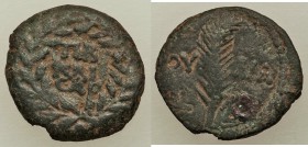 JUDAEA. Roman Procurators. Valerius Gratus (AD 15-26). AE prutah (16mm, 2.05 gm, 11h). VF. Jerusalem, dated Regnal Year 4 of Tiberius (AD 17/8). TIB /...