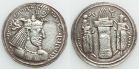 SASANIAN KINGDOM. Narseh (AD 293-302). AR drachm (25mm, 3.65 gm, 4h). VF. Crowned bust of Narseh right / Fire altar flanked by attendants; two symbols...