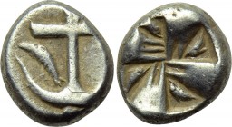 THRACE. Apollonia Pontika. Drachm (Late 5th-4th centuries BC). 

Obv: Upright anchor; crayfish to right.
Rev: Swastika within incuse square.

SNG...