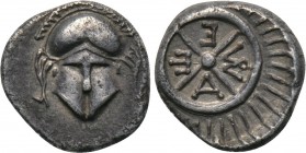 THRACE. Mesambria. Diobol (Circa 4th century BC). 

Obv: Facing Corinthian helmet.
Rev: META. 
Four-spoked wheel.

SNG BM Black Sea 268-71. 

...