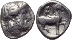 KINGS OF MACEDON. Philip II (359-336 BC). Tetradrachm. Pella. 

Obv: Laureate head of Zeus right.
Rev: ΦΙΛΙΠΠΟΥ. 
Youth riding horse right, holdin...