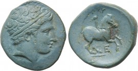 KINGS OF MACEDON. Philip II (359-336 BC). Ae. Uncertain mint in Macedon. 

Obv: Diademed head of Apollo right.
Rev: ΦΙΛΙΠΠΟΥ. 
Youth on horse rear...