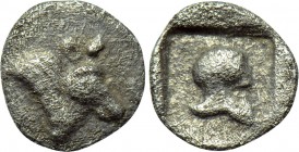 PHOKIS. Federal Coinage. Hemiobol (Circa 450 - 400 BC). 

Obv: Head of bull right.
Rev: Corinthian helmet within incuse square.

BCD Phokis 269.3...