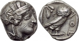 ATTICA. Athens. Tetradrachm (Circa 454-404 BC). 

Obv: Helmeted head of Athena right.
Rev: AΘE. 
Owl standing right, head facing; olive sprig and ...
