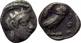 ATTICA. Athens. Obol (Circa 454-404 BC).

Obv: Helmeted head of Athena right.
Rev: AΘE.
Owl standing right, head facing; olive sprig and crescent ...