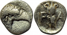 ELIS. Olympia. Obol (Circa 396-380 BC). Zeus. 

Obv: Head of eagle right.
Rev: F - A. 
Flaming thunderbolt with volutes.

BCD Olympia 96-7; HGC ...