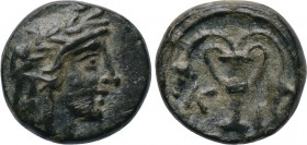 BITHYNIA. Kios. Ae (3rd century BC). 

Obv: Head of Mithras right, wearing a laureate tiara.
Rev: K - I. 
Kantharos with two grape vines; all with...