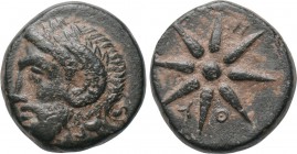 TROAS. Thymbria. Ae (4th century BC). 

Obv: Laureate head of Zeus left, wearing horn of Ammon.
Rev: Θ - Υ. 
Eight-rayed star; monogram below.

...