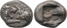 KINGS OF LYDIA. Kroisos (564/53-550/39 BC). 1/12 Stater. Sardes. 

Obv: Confronted foreparts of lion and bull.
Rev: Incuse square punch.

Berk 26...
