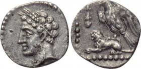 CILICIA. Uncertain. Obol (4th century BC). 

Obv: Male head left, wearing grain wreath.
Rev: Eagle standing left on back of lion seated left; club ...