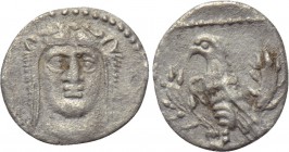 CILICIA. Uncertain. Obol (4th century BC). 

Obv: Facing head of Herakles, wearing lion skin.
Rev: Eagle standing left on horned head of stag; all ...