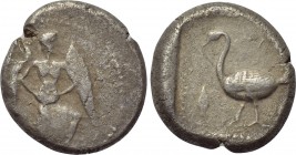 CILICIA. Mallos. Stater (Circa 440-390 BC). 

Obv: Winged male figure advancing right, holding solar disk with both hands.
Rev: MAΛ. 
Swan standin...