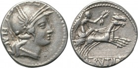 L. RUTILIUS FLACCUS. Denarius (77 BC). Rome. 

Obv: FLAC. 
Helmeted head of Roma right.
Rev: L RVTILI. 
Victory driving biga right, holding reins...