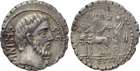 T. VETTIUS SABINUS. Serrate Denarius (70 BC). Rome. 

Obv: SABINVS S C. 
Bare head of king Tatius right, monogram to lower right.
Rev: IVDEX / T V...