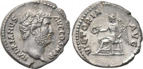 HADRIAN (117-138). Denarius. Rome. 

Obv: HADRIANVS AVG COS III P P. 
Bare head right.
Rev: VICTORIA AVG. 
Victory seated left on throne, holding...
