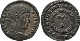 CRISPUS (Caesar, 316-326). Follis. Treveri. 

Obv: IVL CRISPVS NOB C. 
Laureate head right.
Rev: CAESARVM NOSTRORVM / STR (crescent). 
VOT / X in...